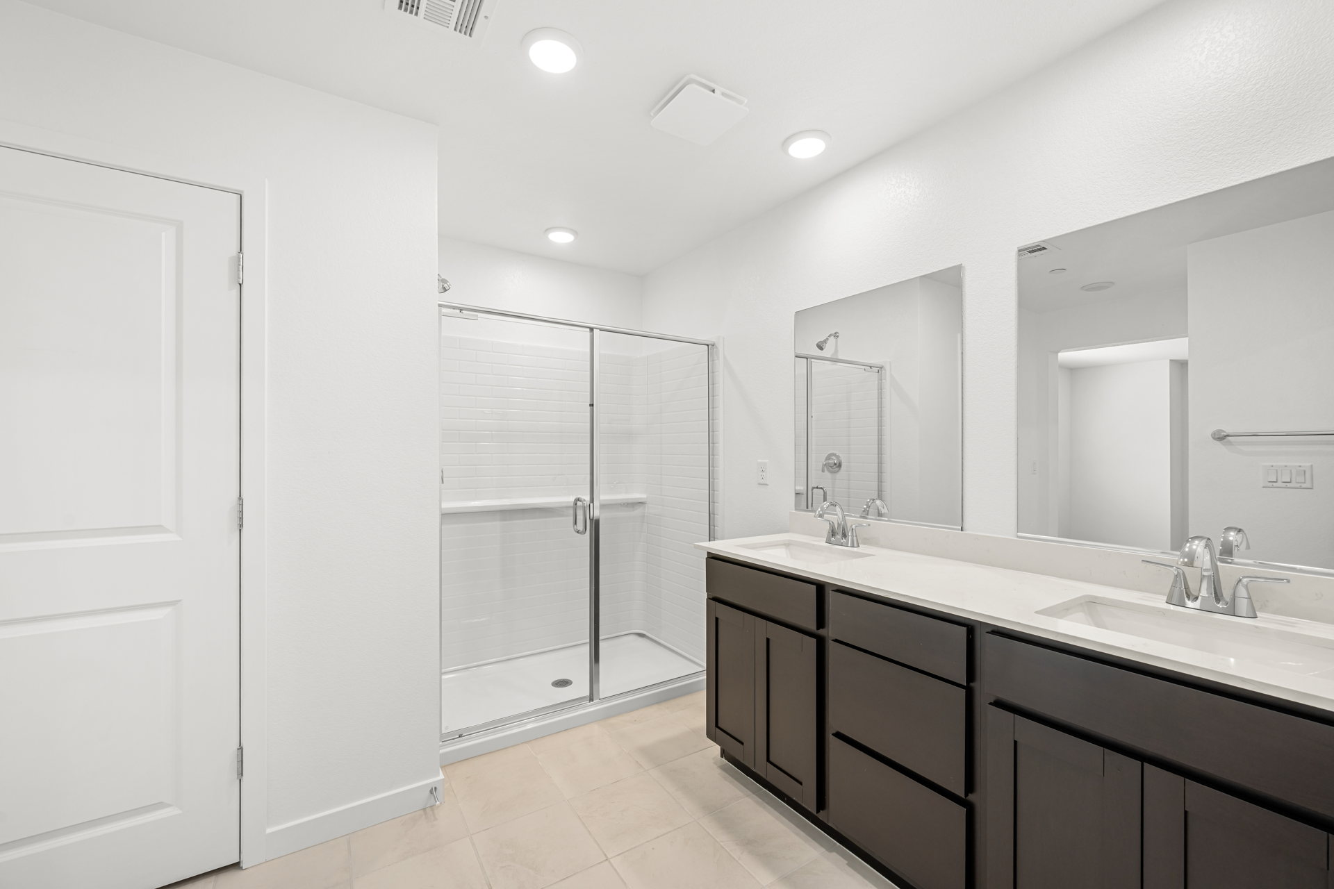 A bathroom with a glass shower.
