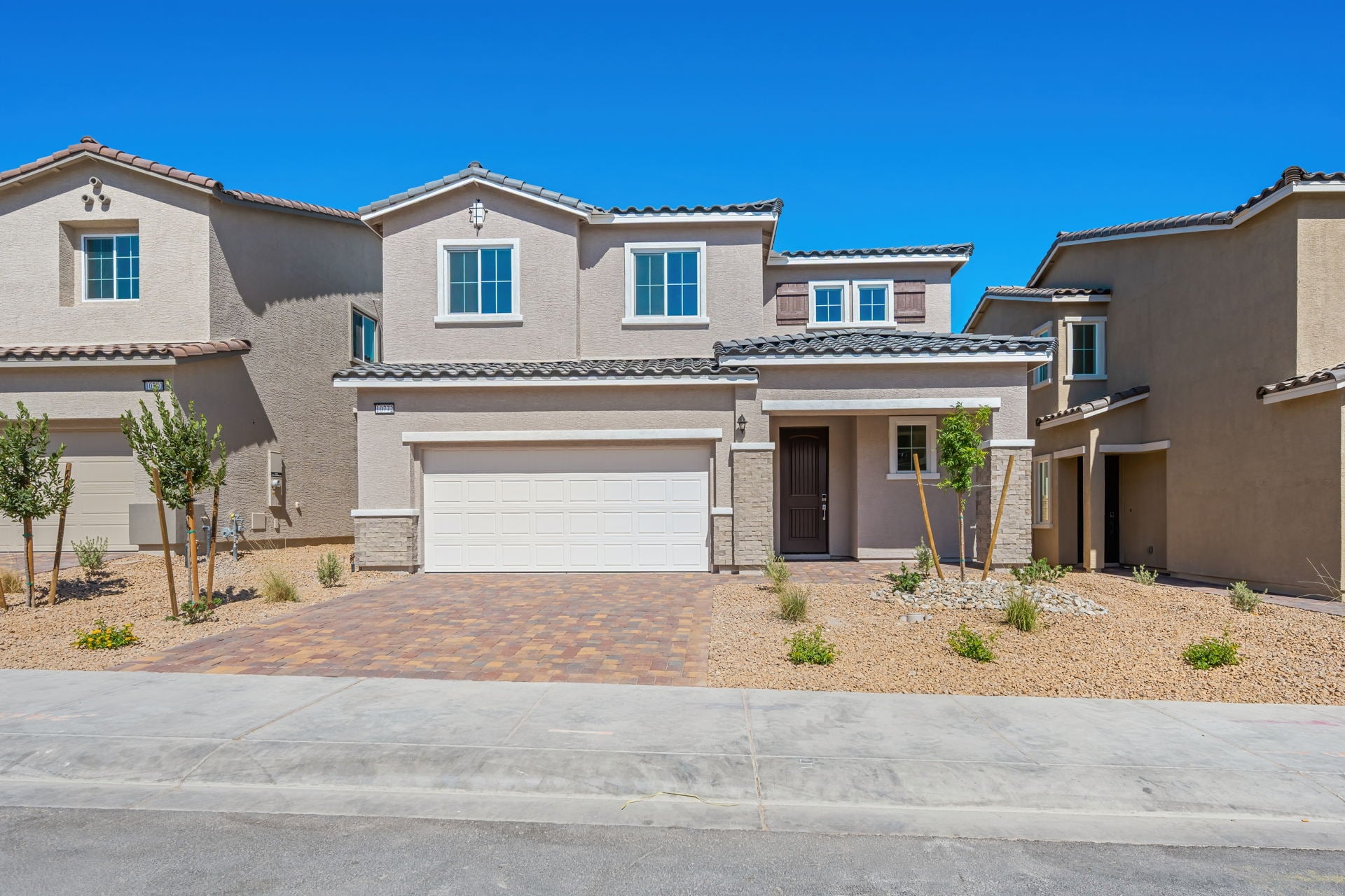 A large house with a garage.