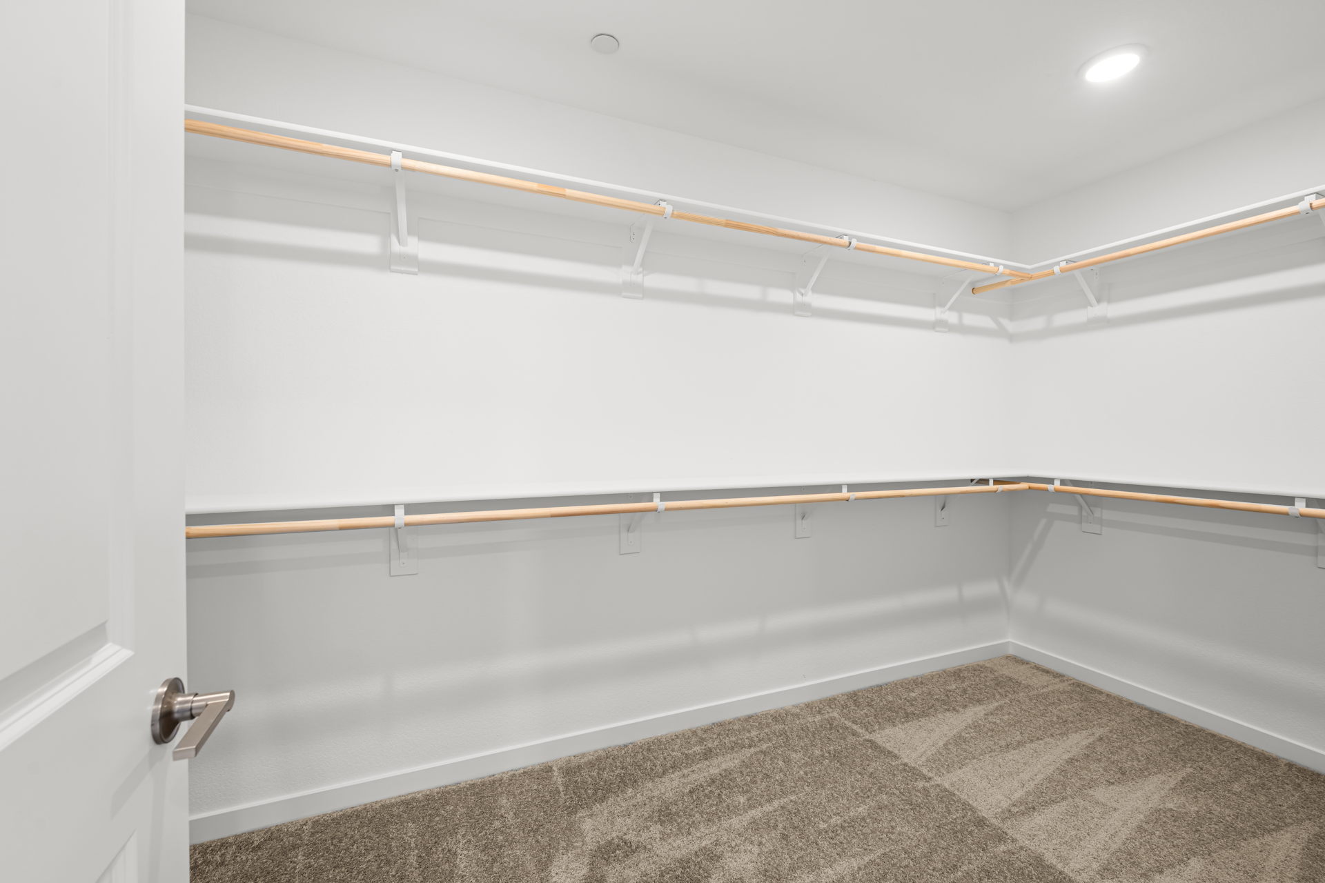A white room with a white wall.