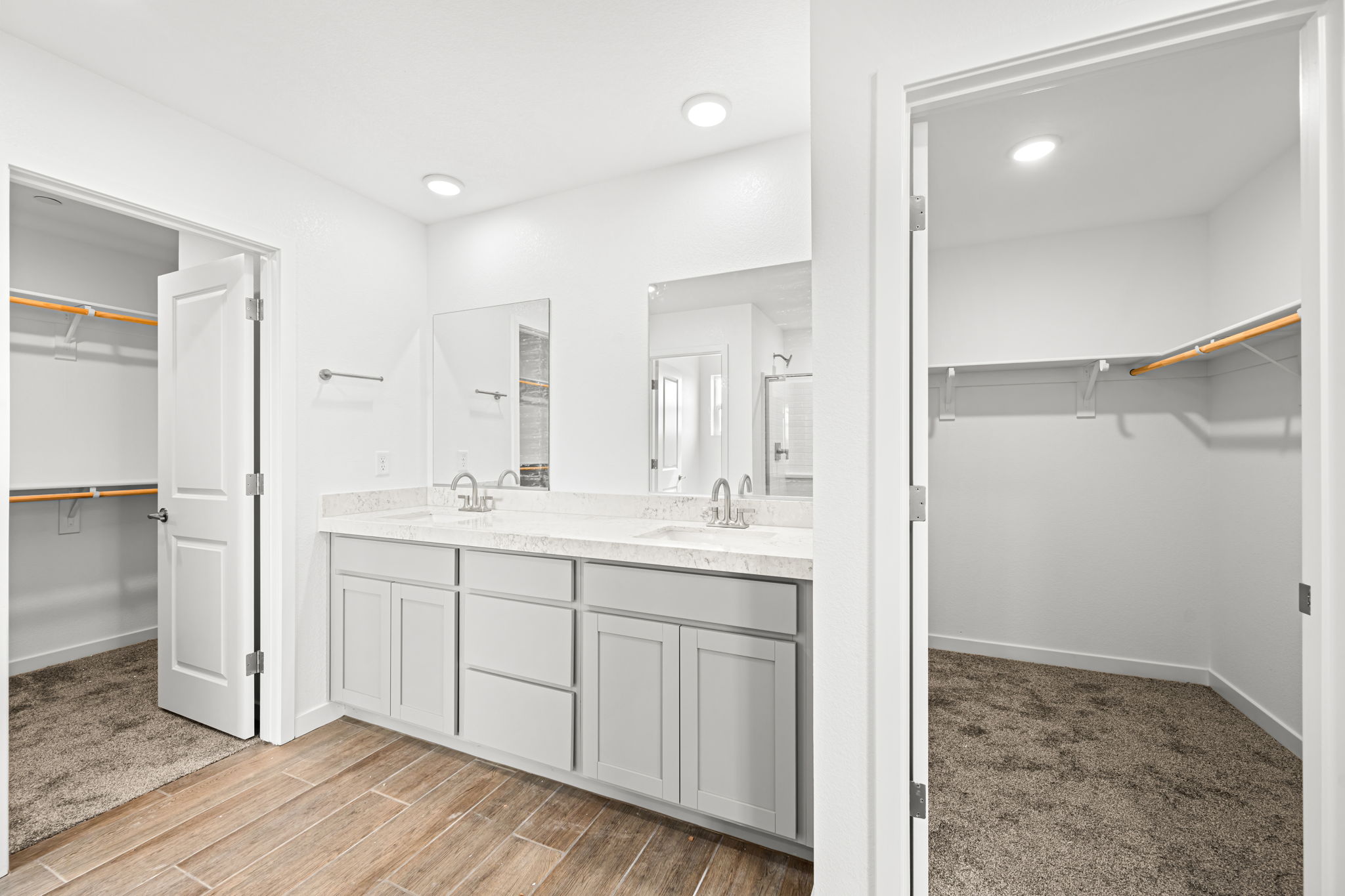 A white kitchen with white cabinets.