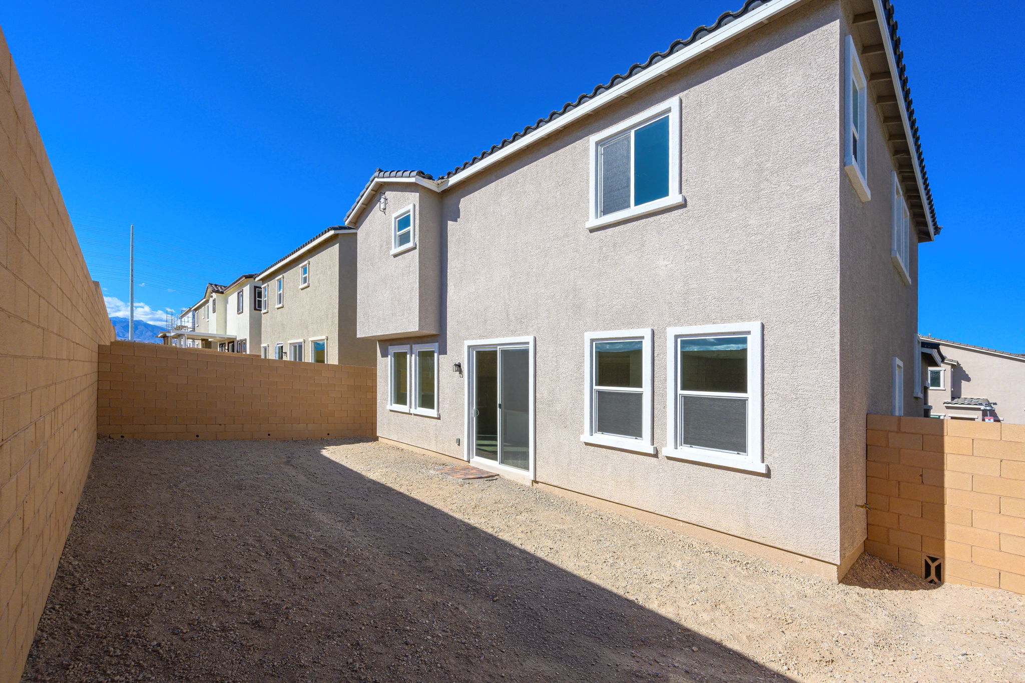 A building with a brick wall.