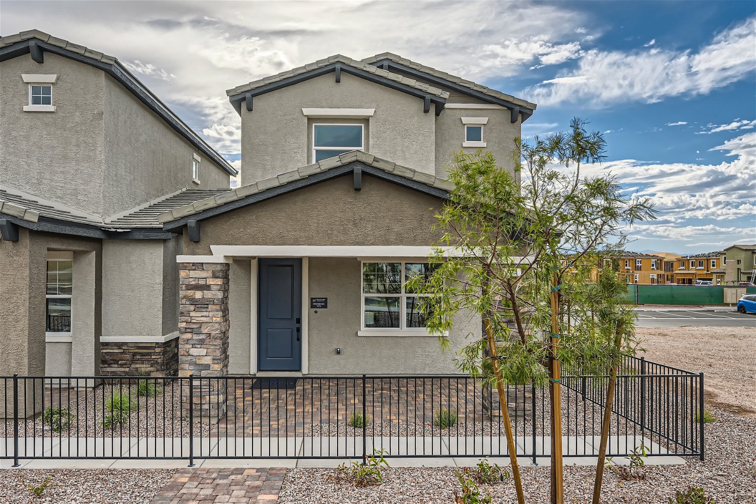 A house with a fence around it.