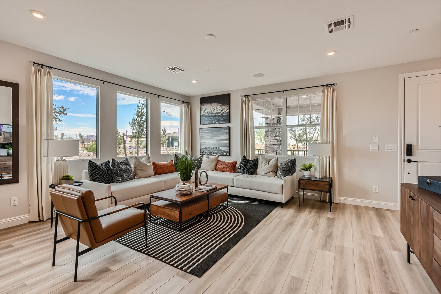 A living room with a large window.