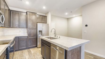 A kitchen with stainless steel appliances.