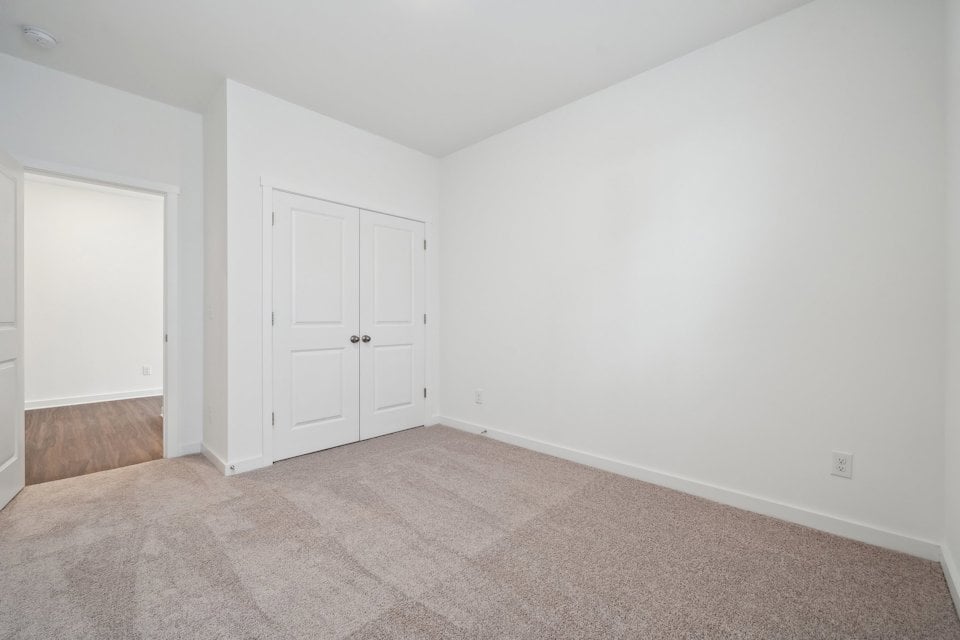 A room with white doors.
