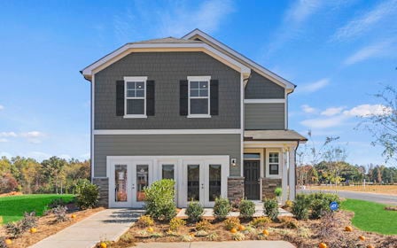 A house with a driveway.