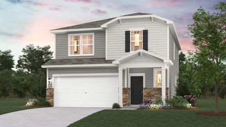 A white house with a driveway.