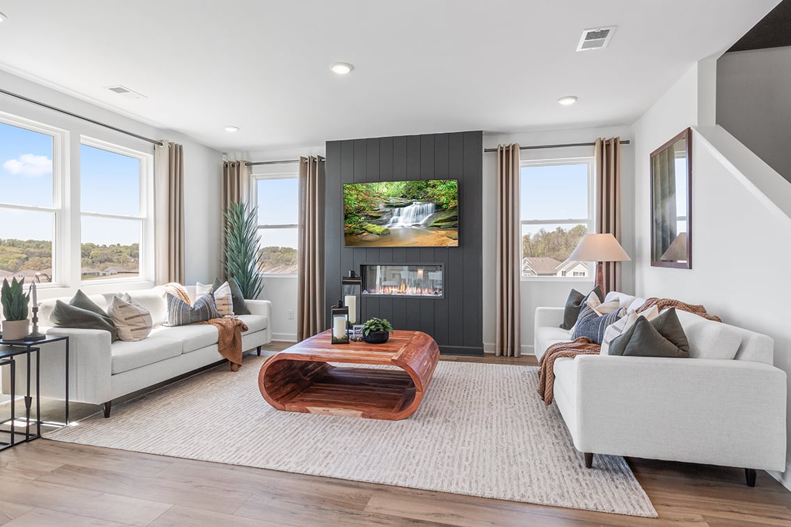 A living room with a large window.