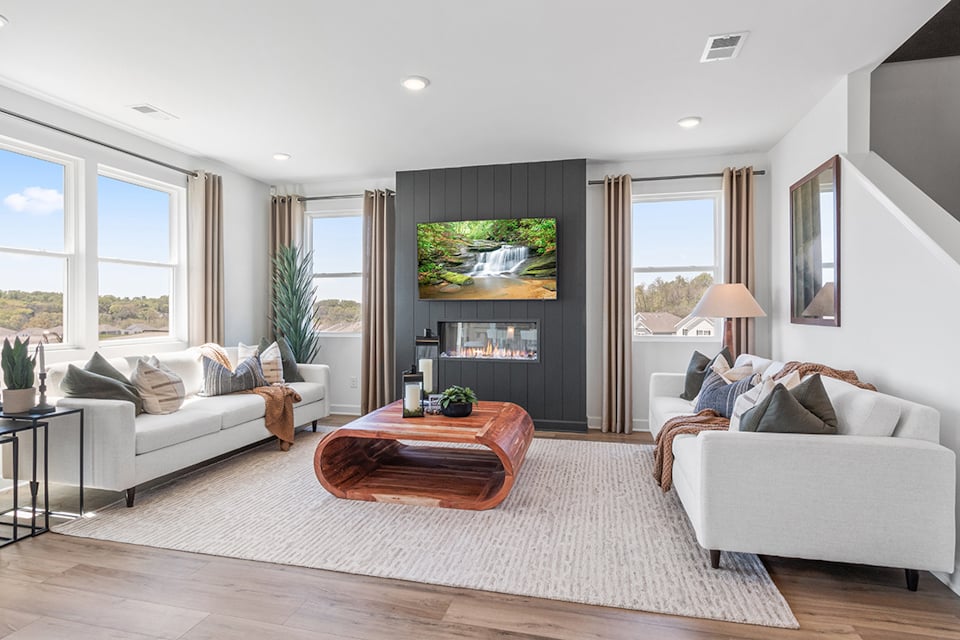 A living room with a large window.