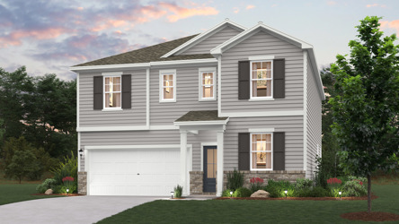 A white house with a driveway.