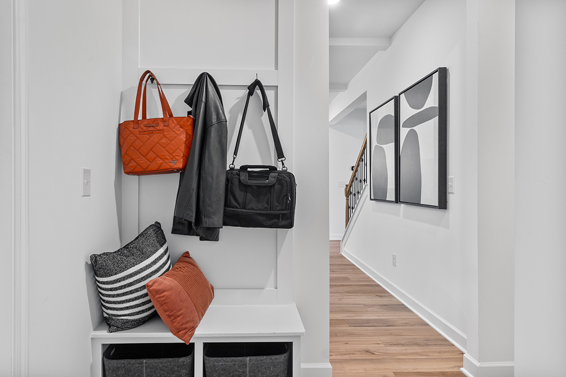 A room with a table and a mirror.