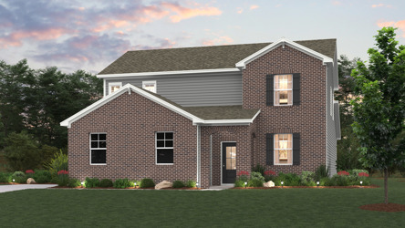 A house with a lawn in front of it.