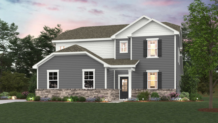 A house with a lawn in front of it.