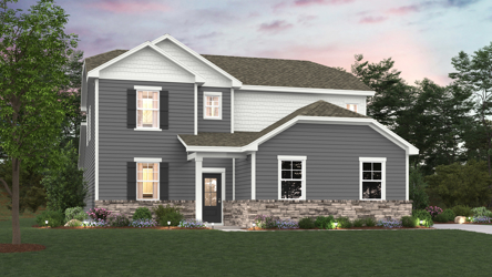 A house with a lawn in front of it with Graceland in the background.