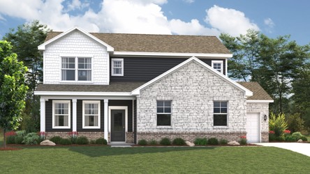 A house with a lawn in front of it.