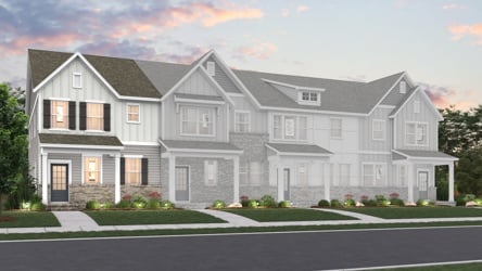 A large house with a driveway.