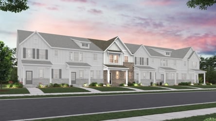 A large house with a driveway.