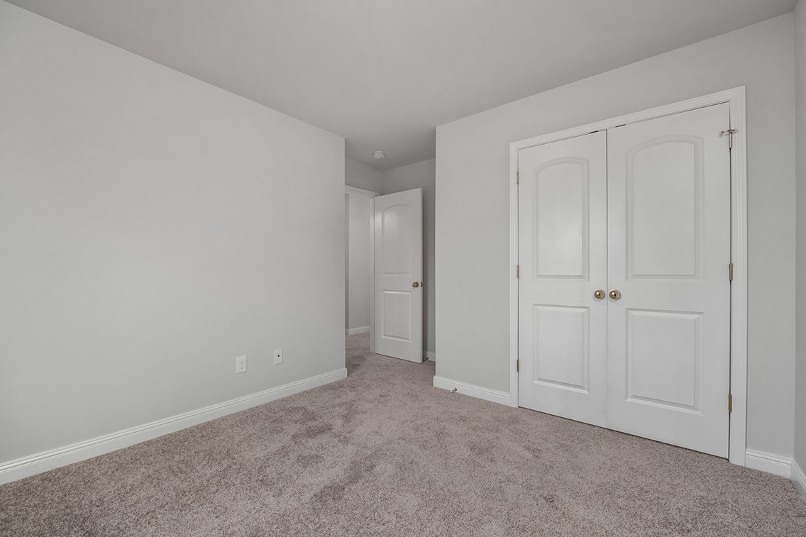 A room with white doors.