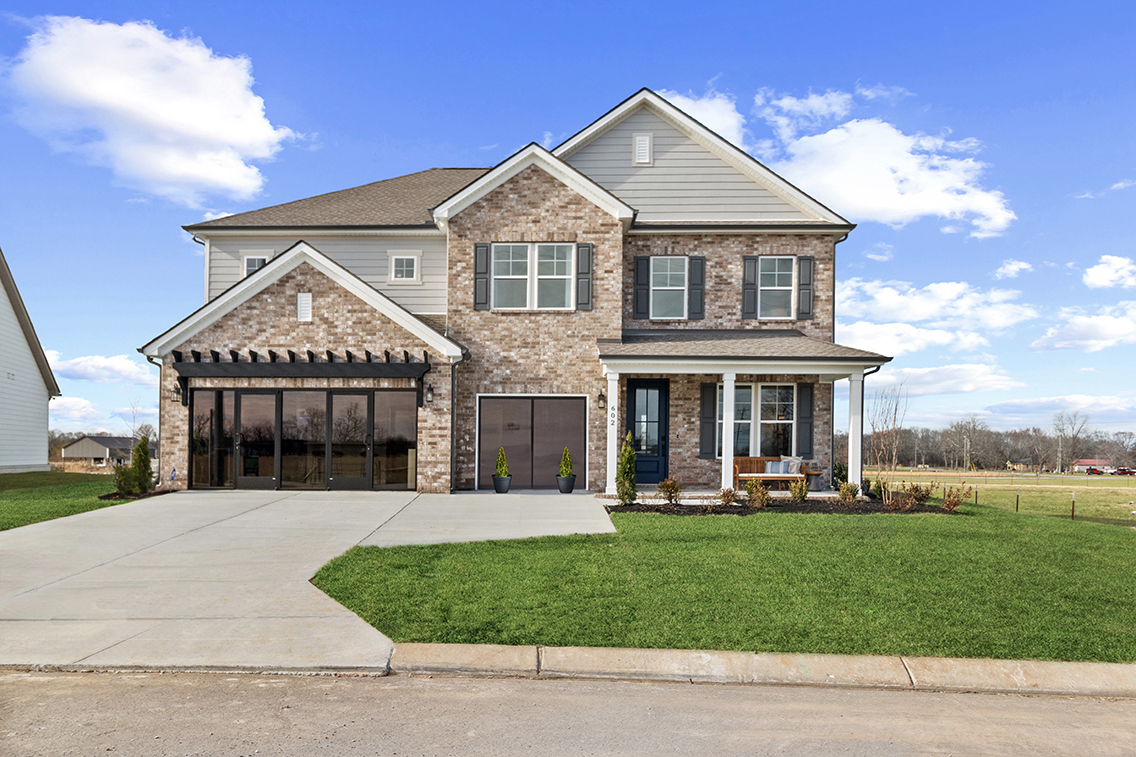 A house with a lawn.