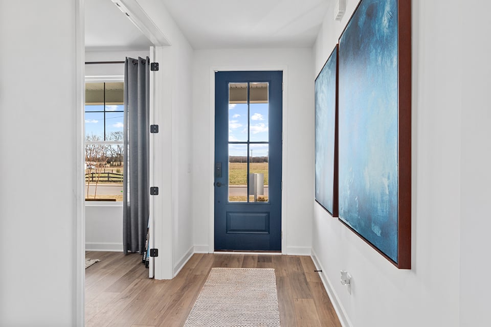A room with a door and a window.