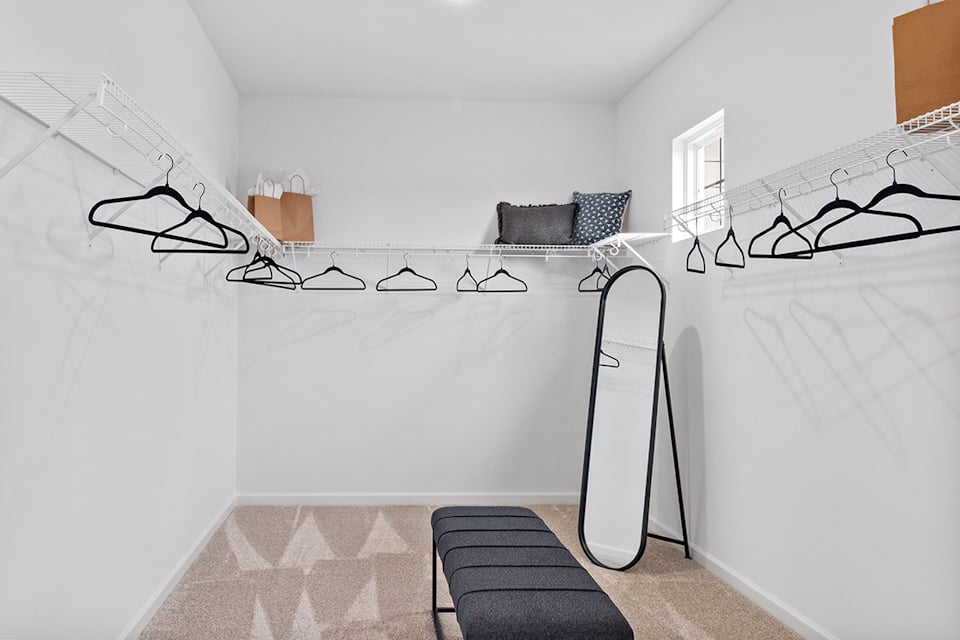 A room with a bed and a couch.
