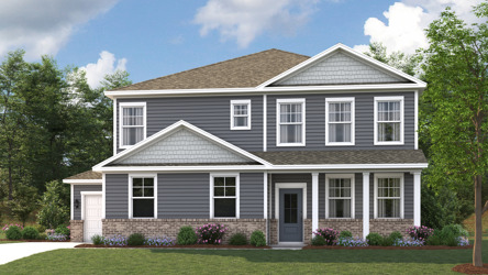 A house with a lawn in front of it.