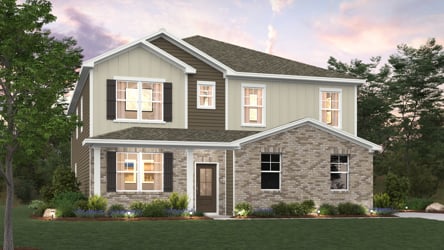 A house with a lawn in front of it.