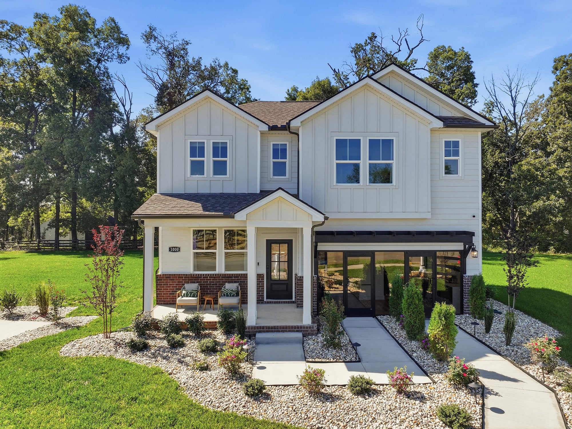 A house with a large front yard.