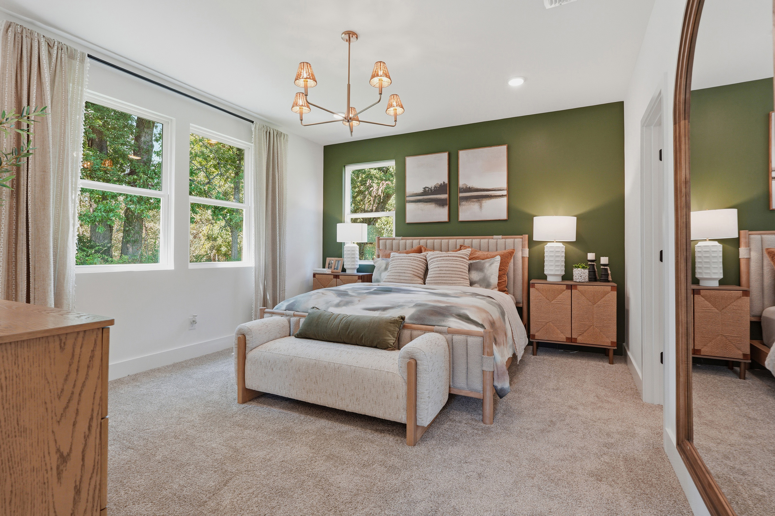 A bedroom with a large bed.