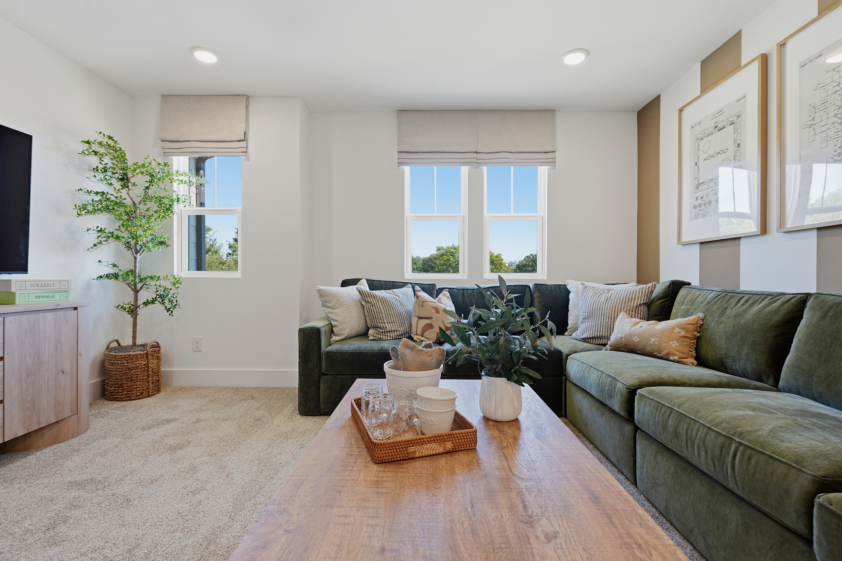 A living room with a couch and a coffee table.