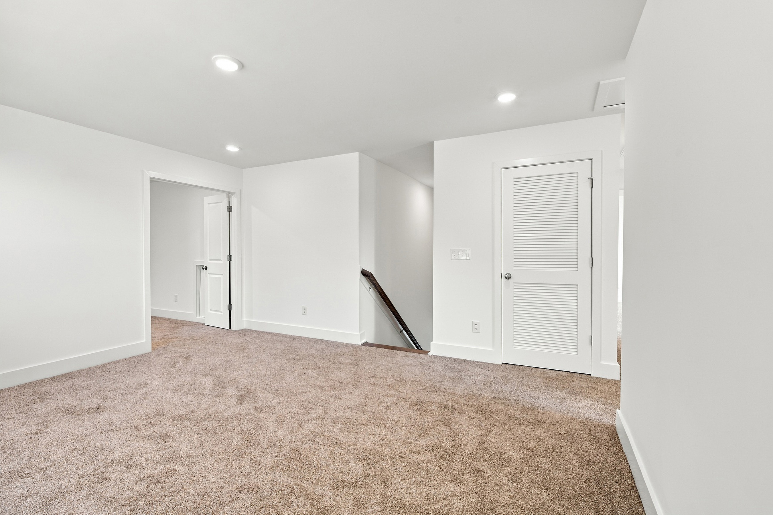 A room with white doors.