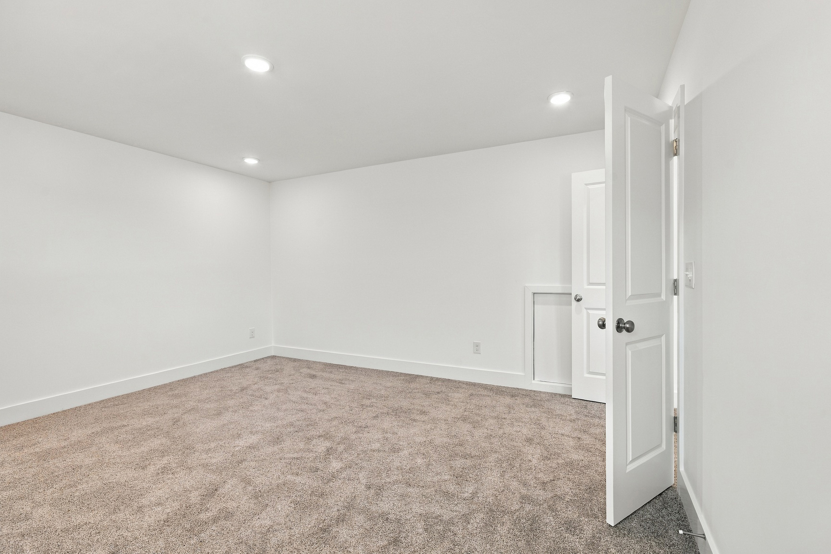 A room with white doors.