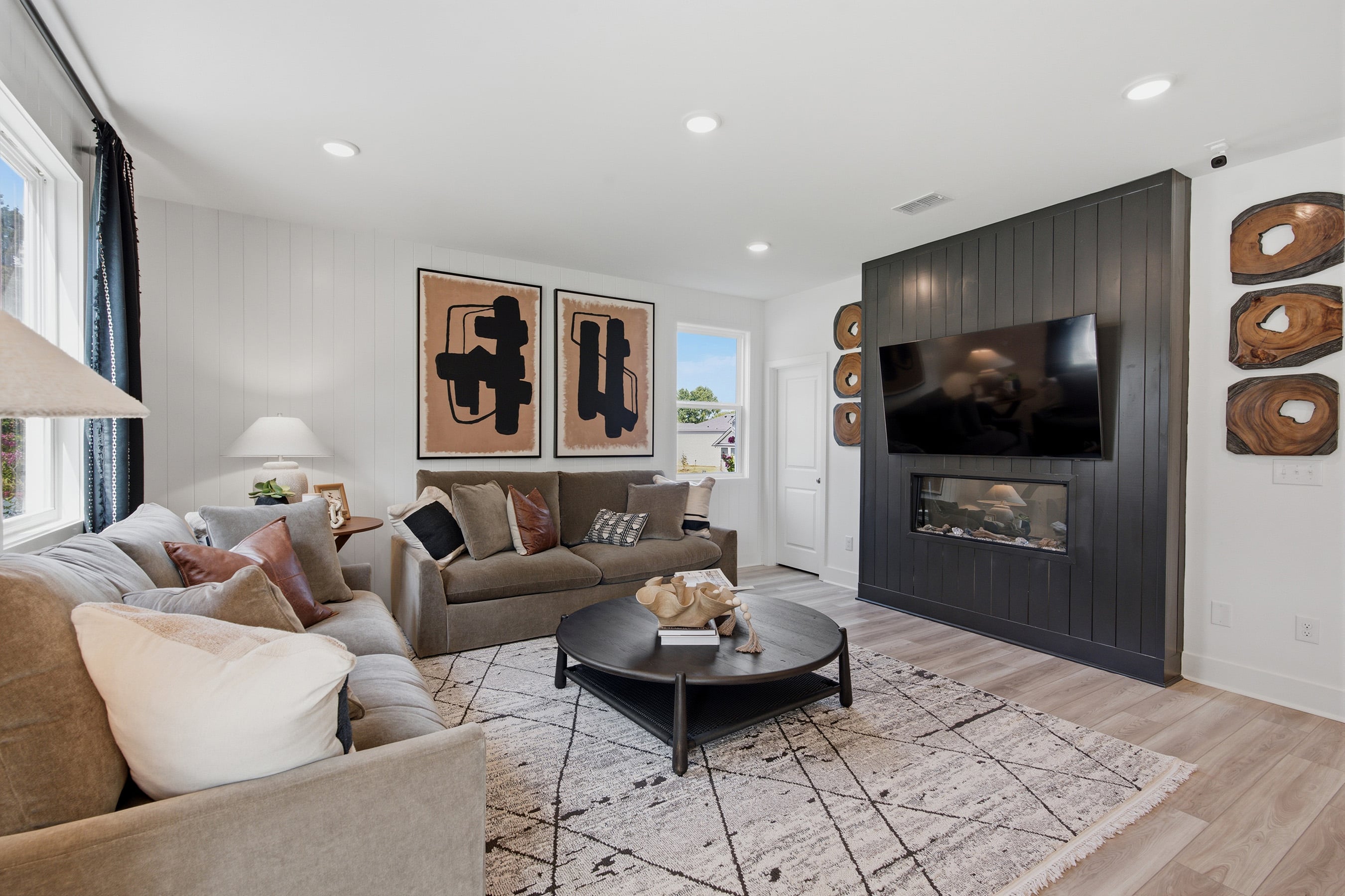 A living room with a fireplace.
