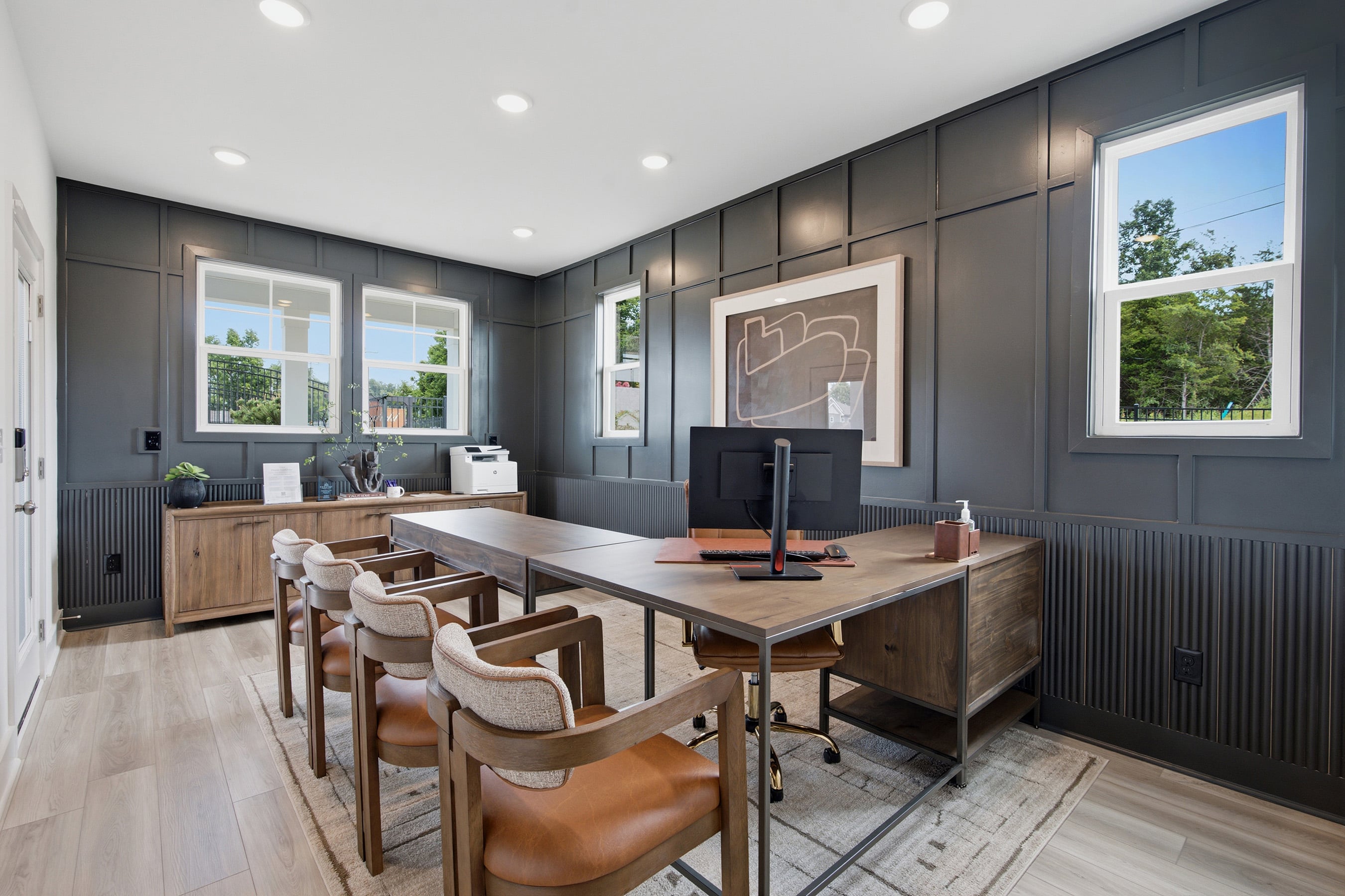 A room with a table and chairs.