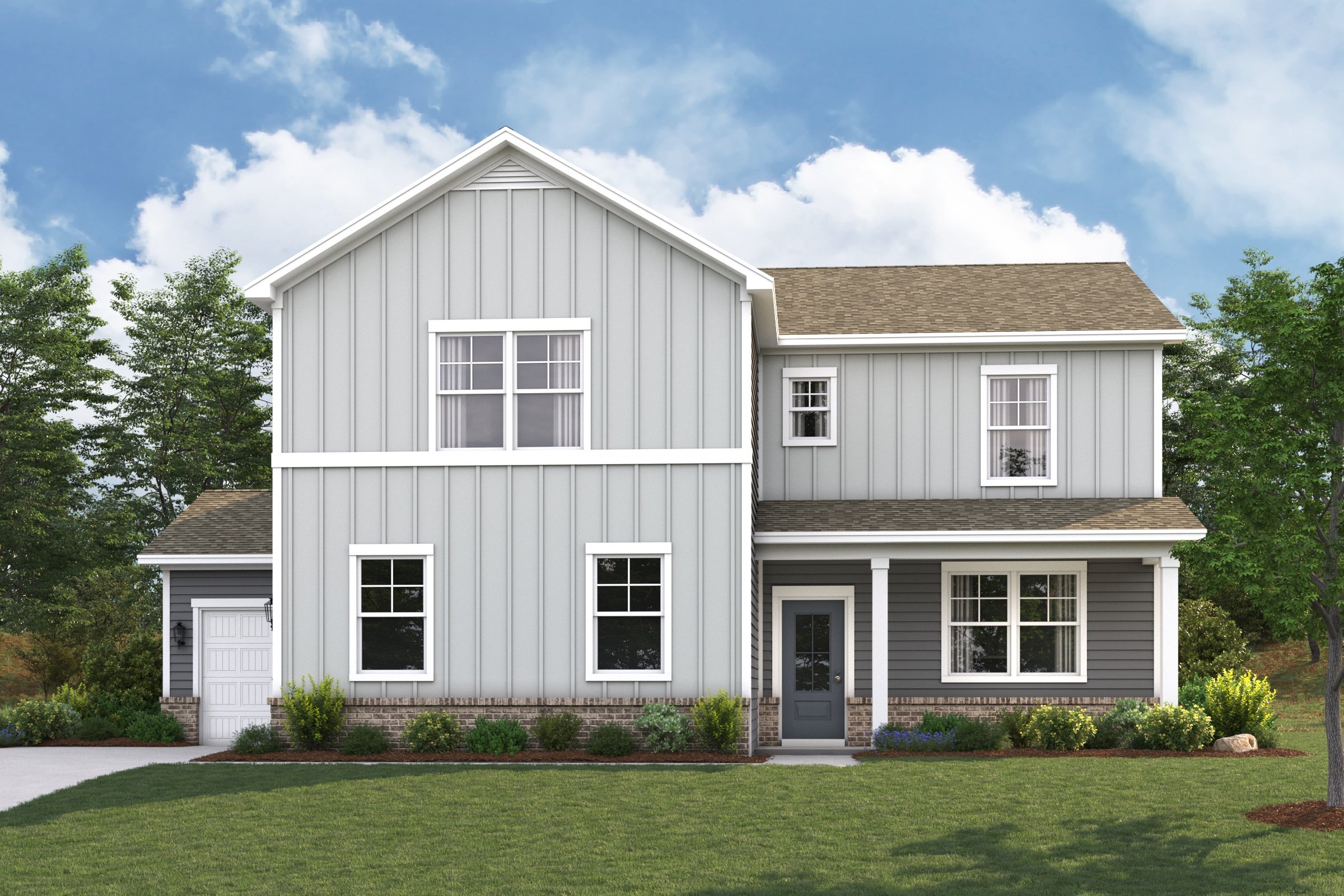 A white house with a lawn.