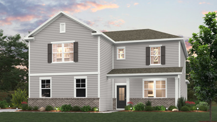 A grey house with a lawn.