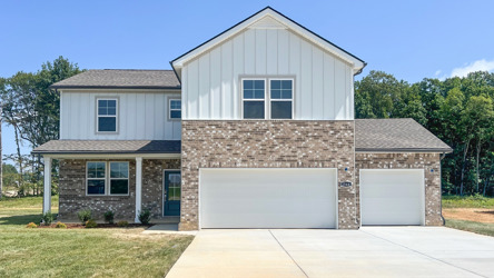 A house with a stone wall.