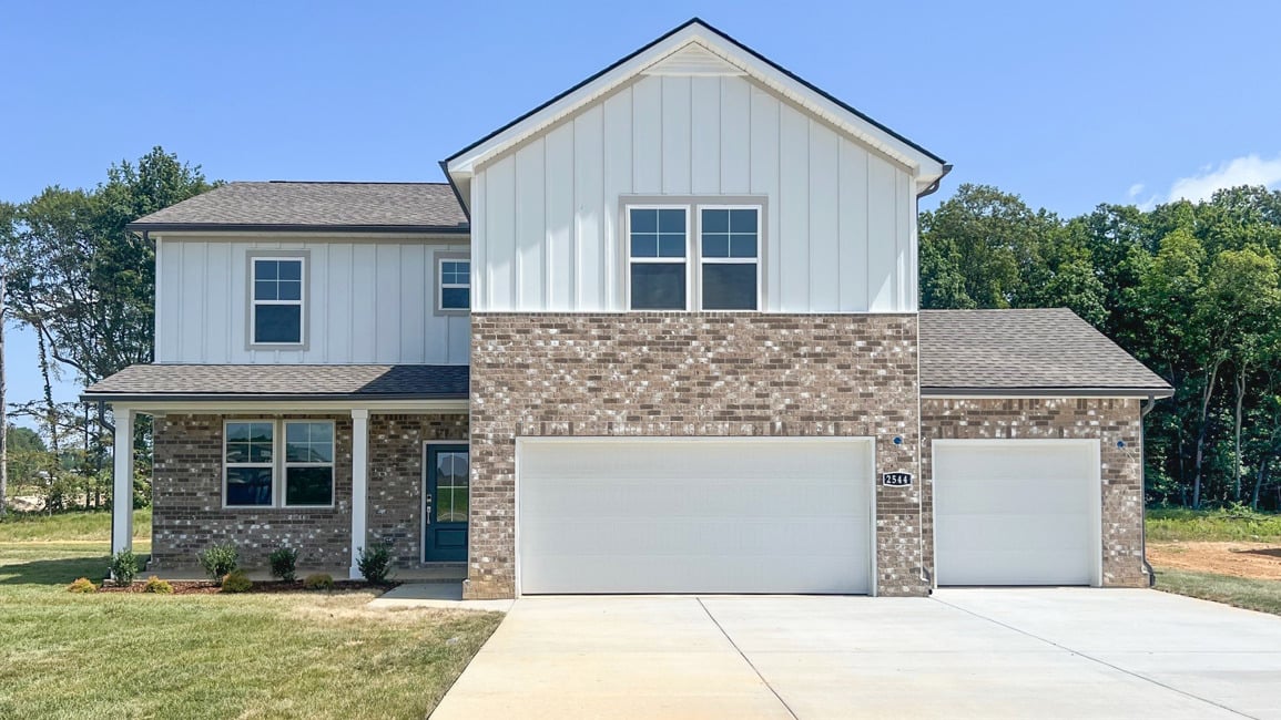 A house with a stone wall.