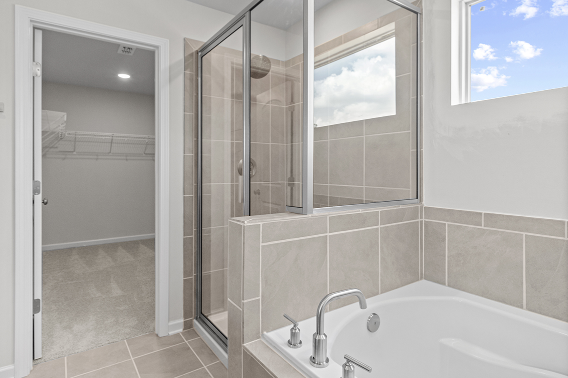 A bathroom with a glass shower.