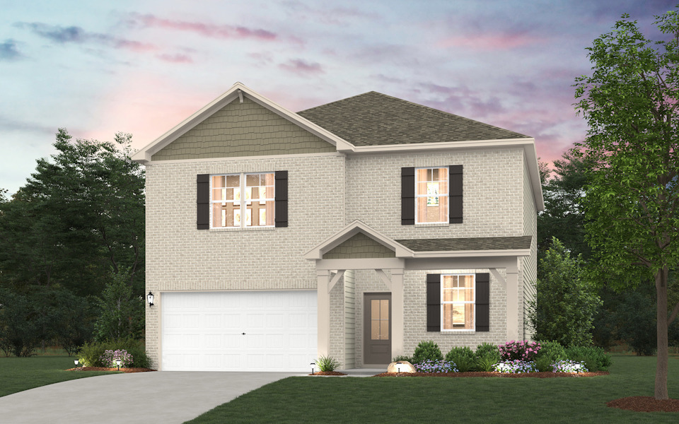 A house with a garage and trees.