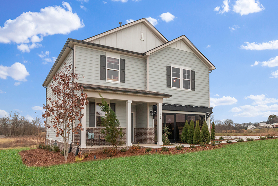A house with a yard and trees.