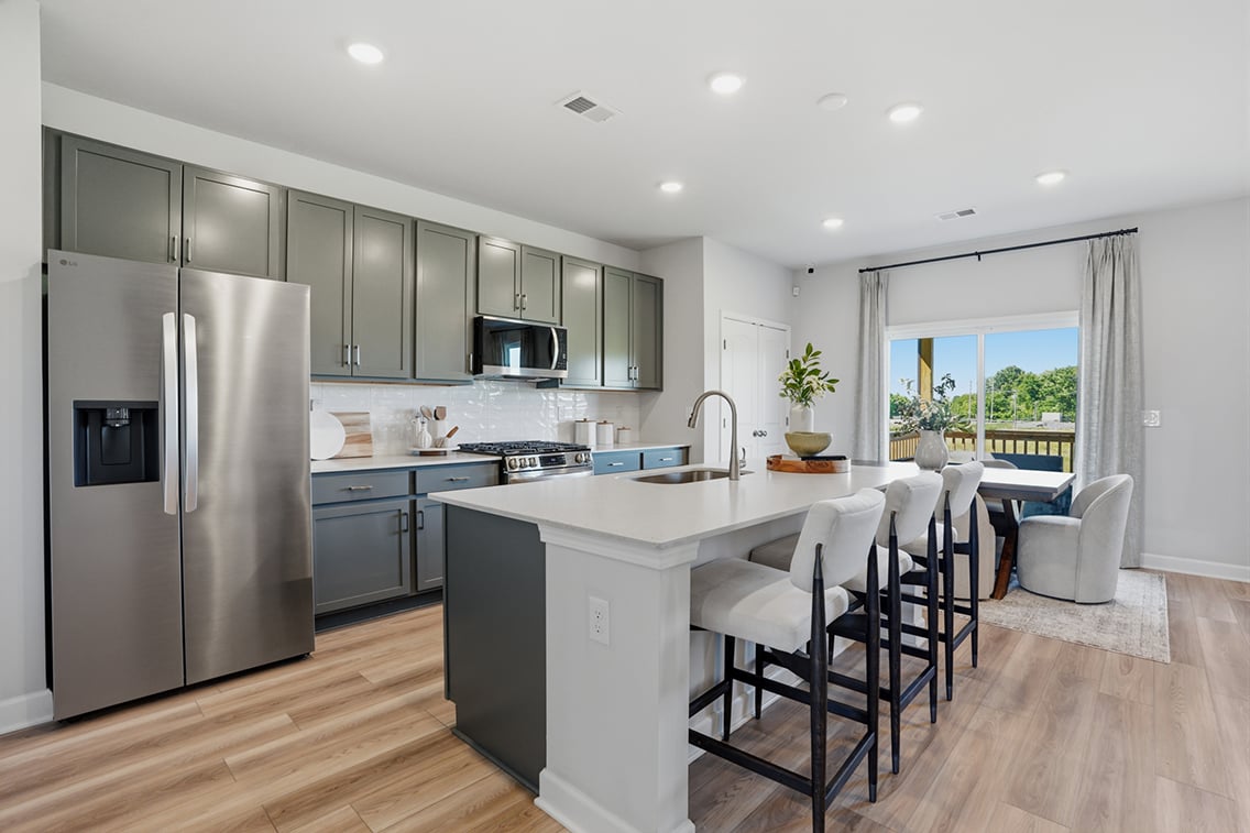 A kitchen with a large island.