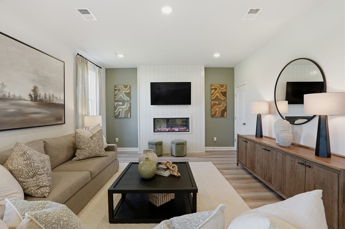 A living room with a fireplace.