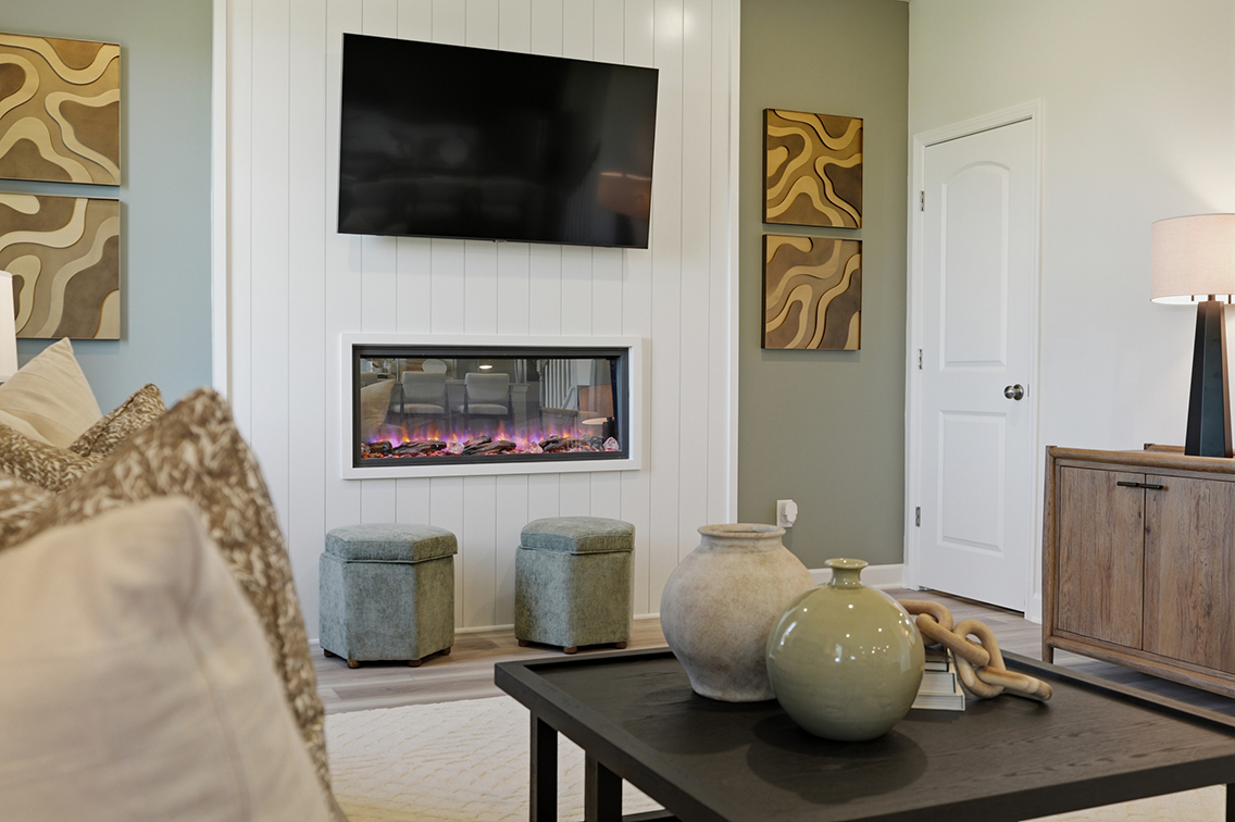 A living room with a fireplace.