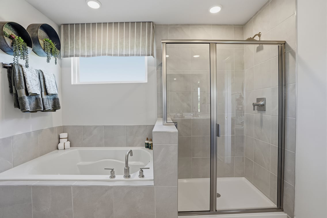 A bathroom with a glass shower.