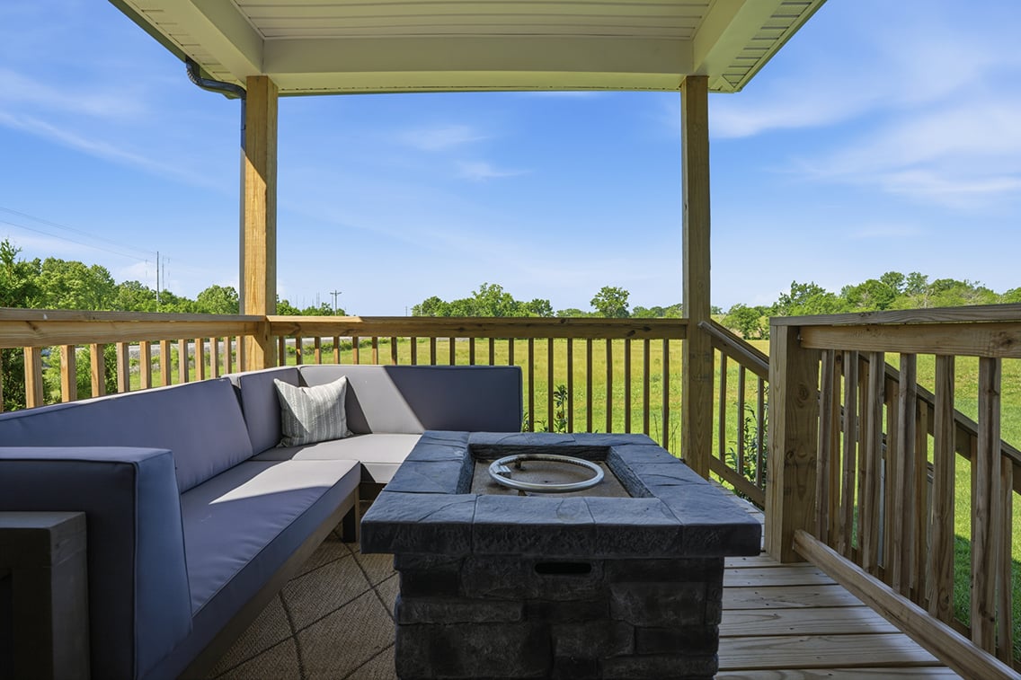 A deck with a grill and a grill on it.