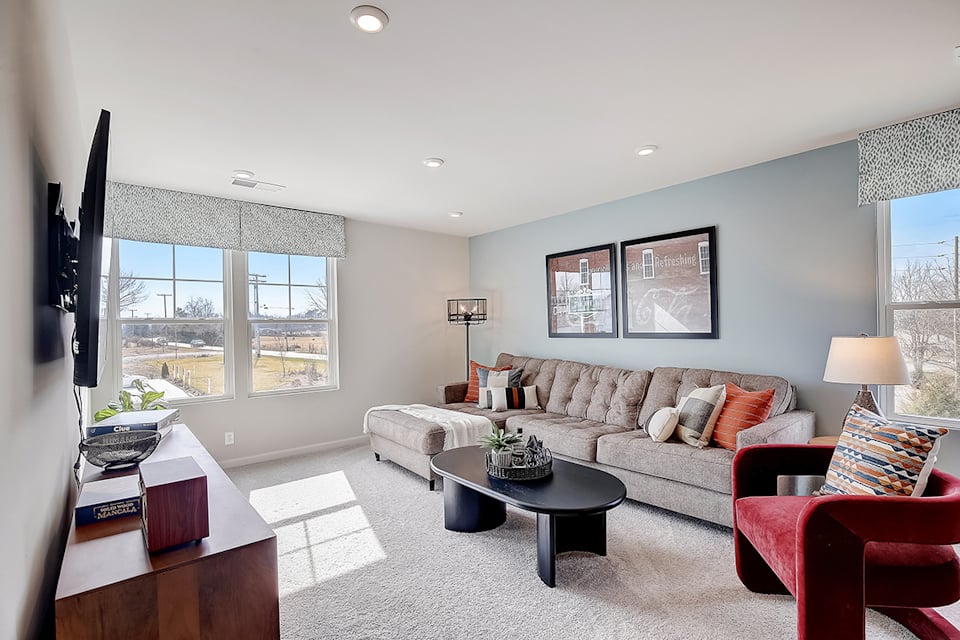 A living room with a couch and a coffee table.