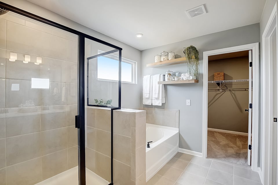 A bathroom with a glass shower.