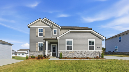 A house with a stone wall.