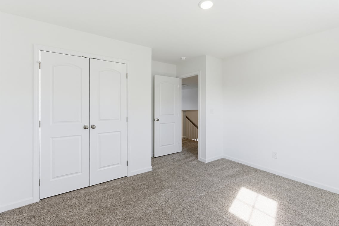 A room with white doors.